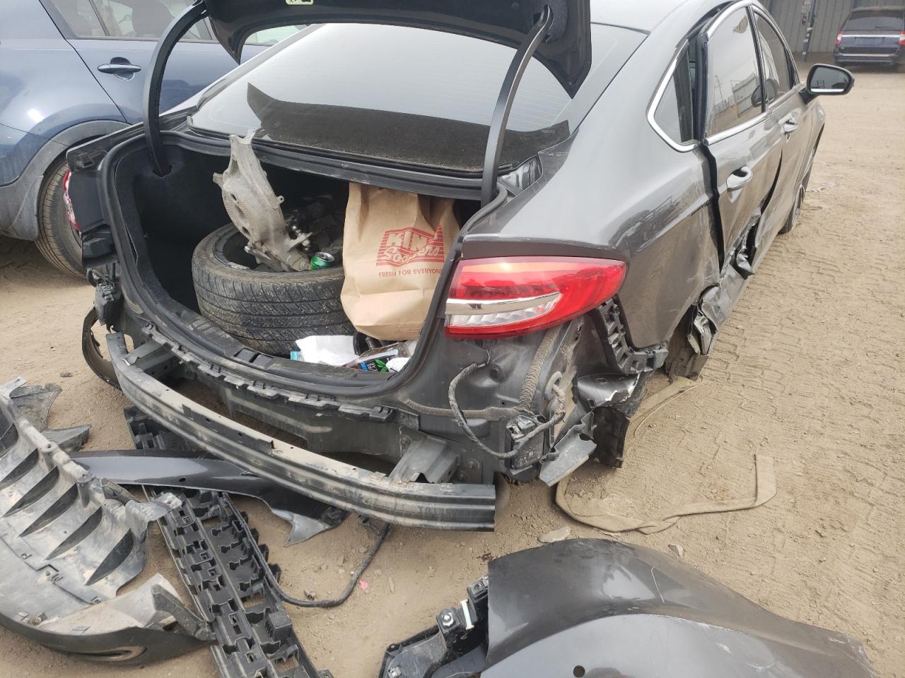Photo 9 from auction – 2019 FORD FUSION TIT with VIN 3FA6P0D92KR154572
