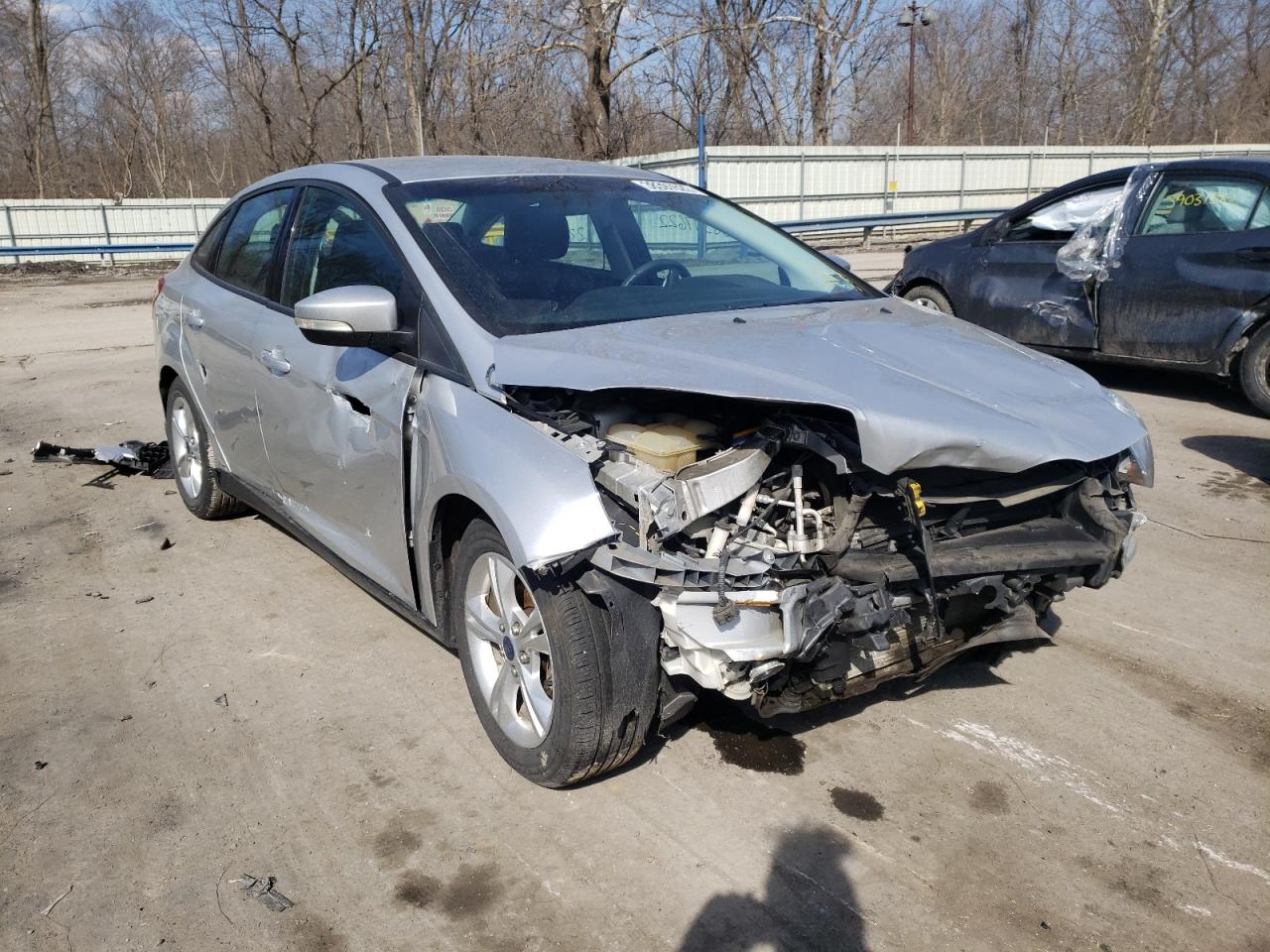 FORD FOCUS SE 2014 with VIN 1FADP3F20EL269862 - Photo from auction