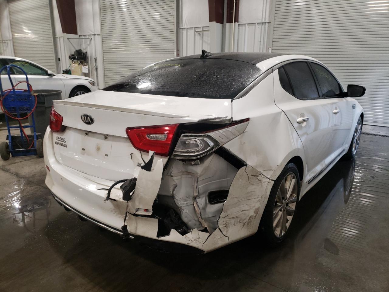 Photo 4 from auction – 2014 KIA OPTIMA SX with VIN 5XXGR4A69EG287441