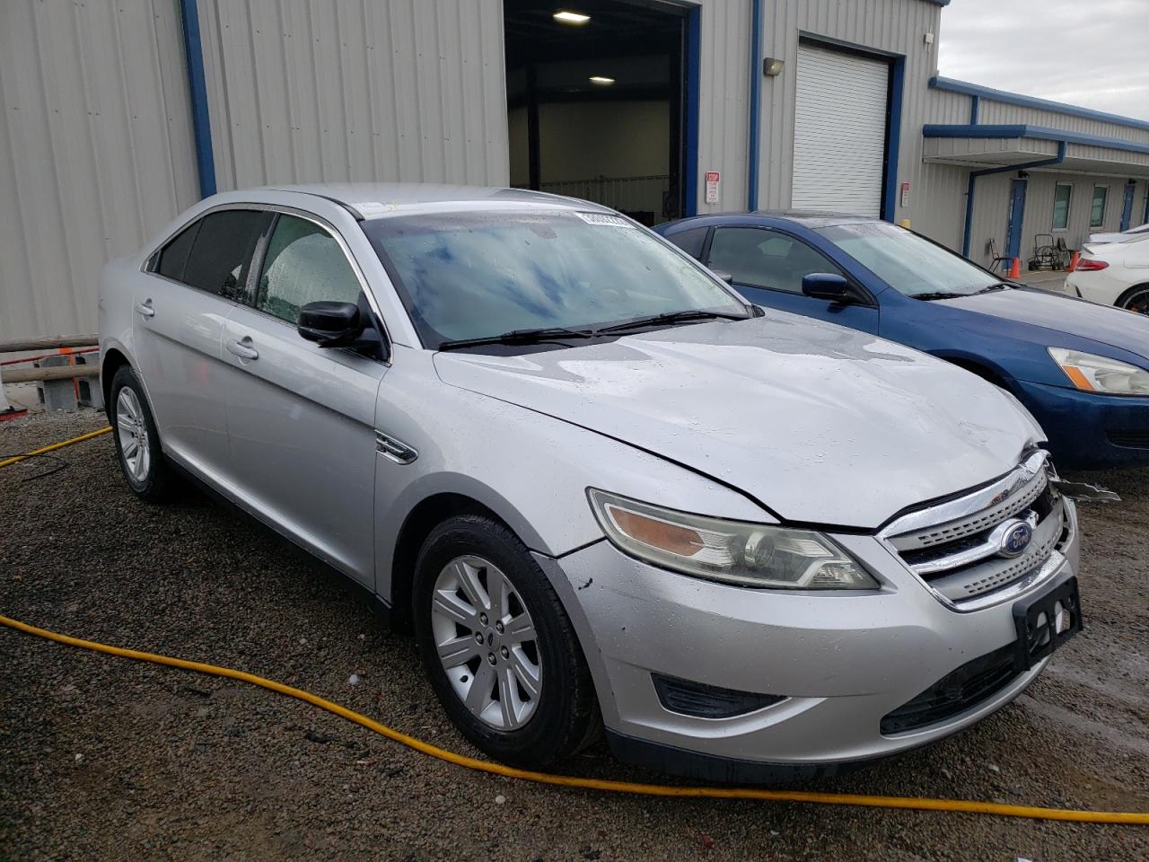 FORD TAURUS SE 2011 with VIN 1FAHP2DW1BG181134 - Photo from auction