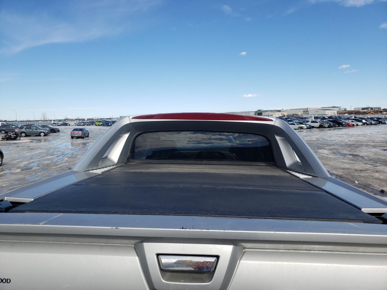 Photo 9 from auction – 2011 CHEVROLET AVALANCHE with VIN 3GNTKFE32BG308015