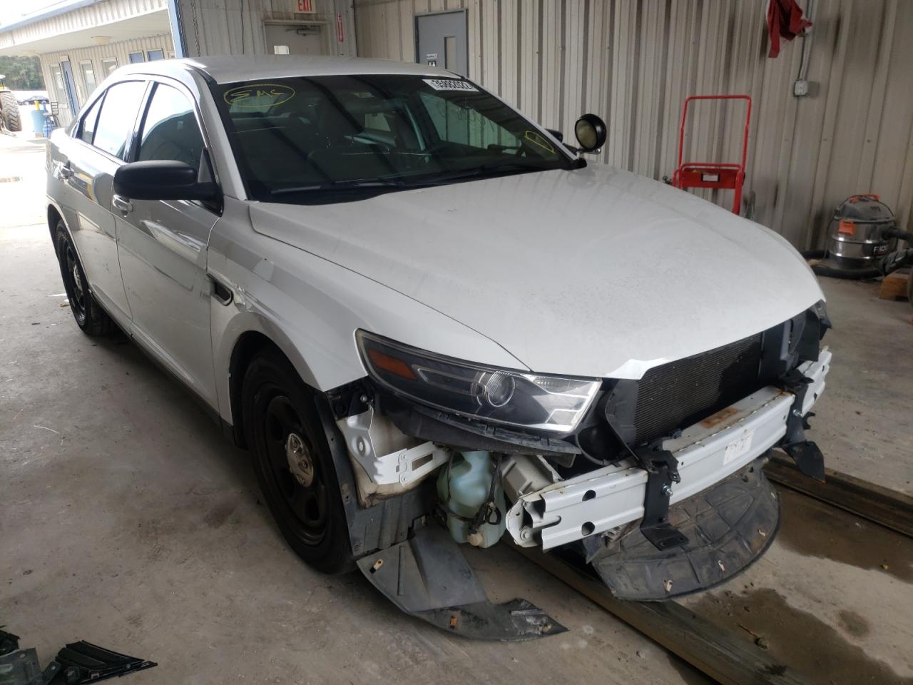 FORD TAURUS POL 2016 with VIN 1FAHP2MK5GG138498 - Photo from auction