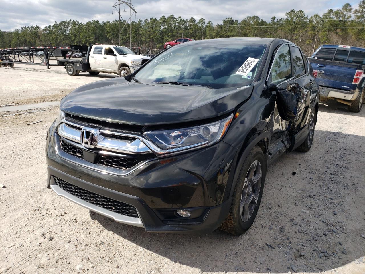 Photo 2 from auction – 2017 HONDA CR-V EX with VIN 7FARW1H59HE020387