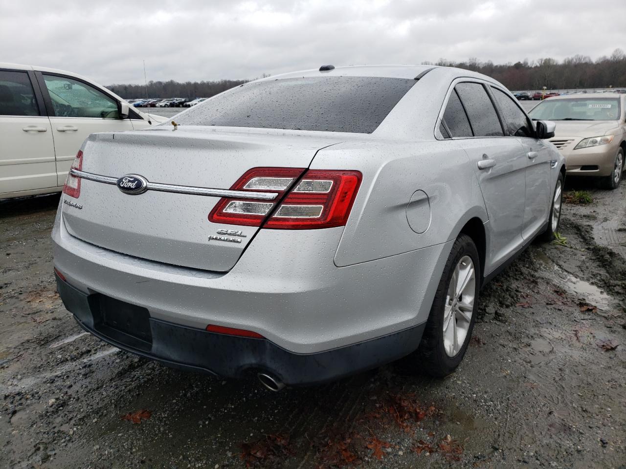 Photo 4 from auction – 2014 FORD TAURUS SEL with VIN 1FAHP2E82EG132688
