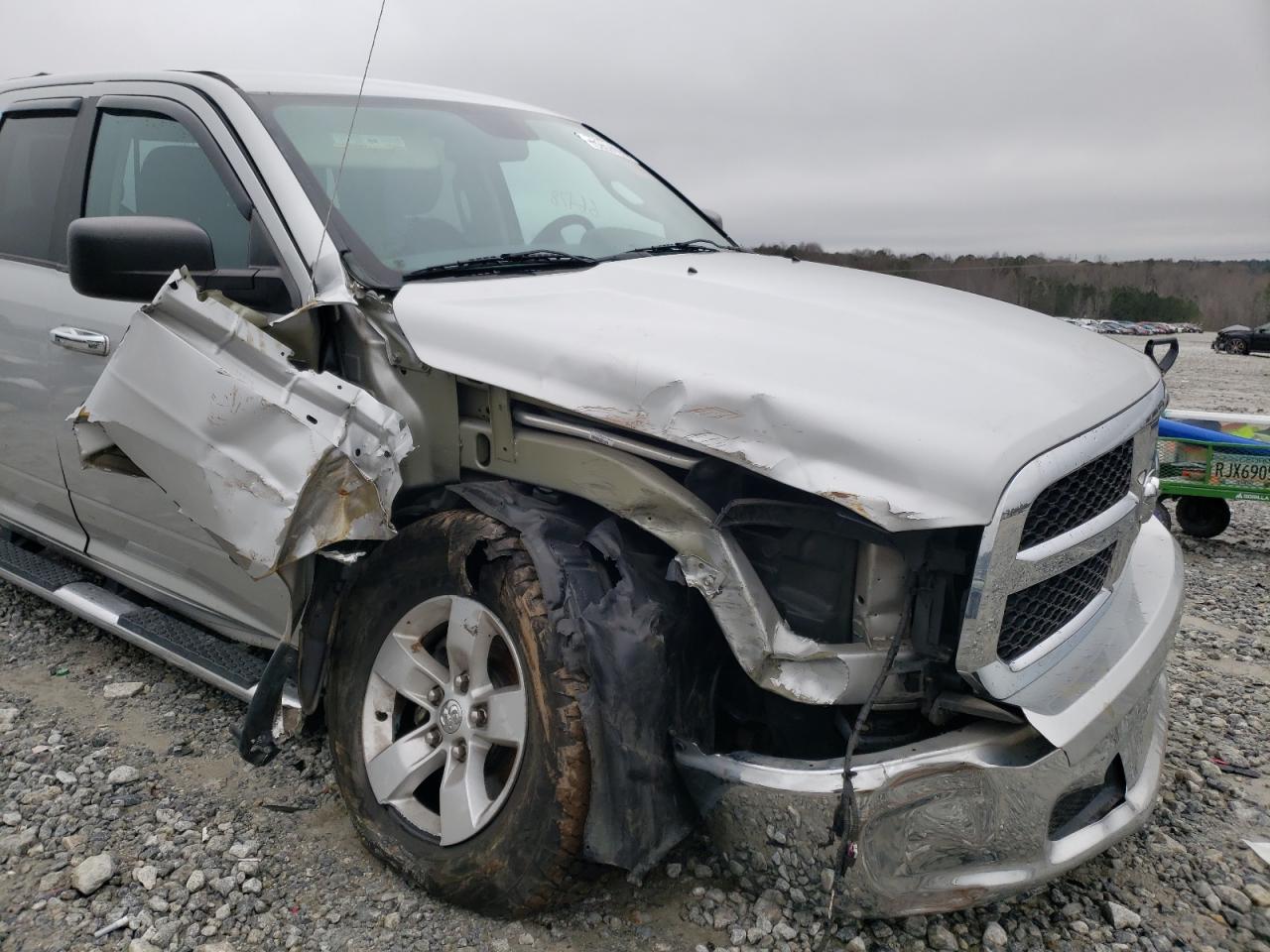 Photo 9 from auction – 2014 RAM 1500 SLT with VIN 1C6RR6GT5ES390242