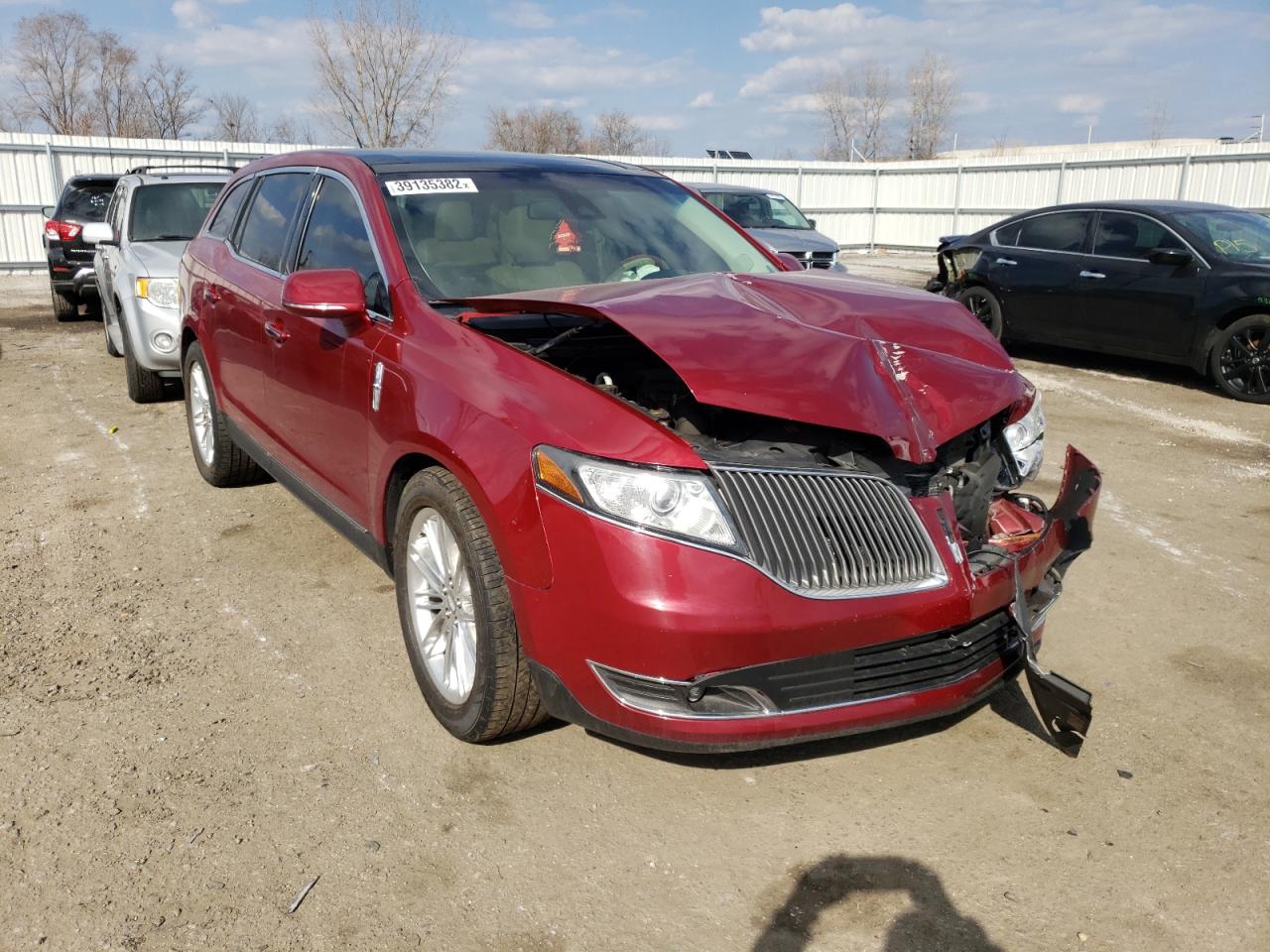 LINCOLN MKT 2014 with VIN 2LMHJ5AT5EBL54852 - Photo from auction