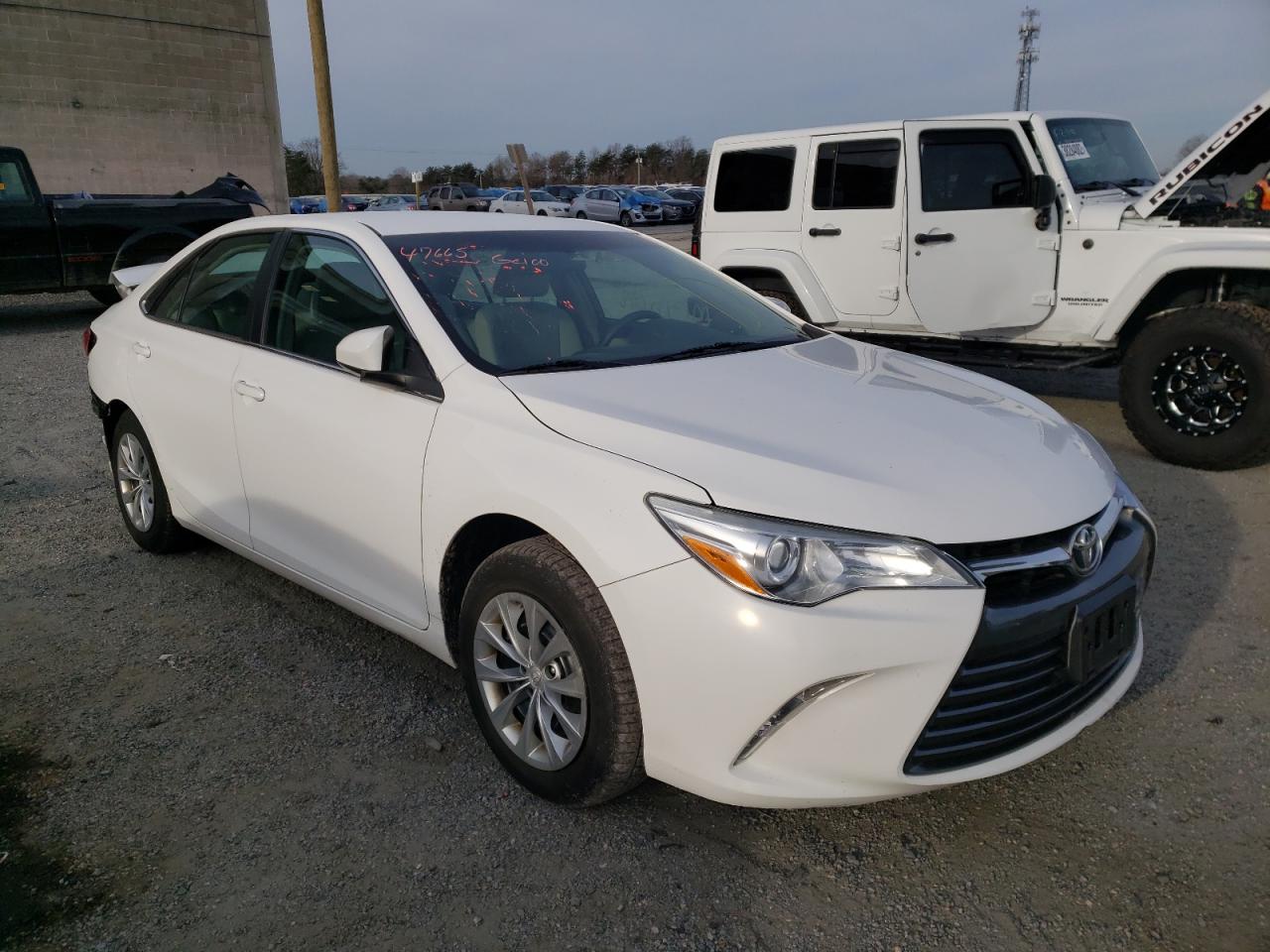 TOYOTA CAMRY LE 2016 with VIN 4T1BF1FK6GU156872 - Photo from auction