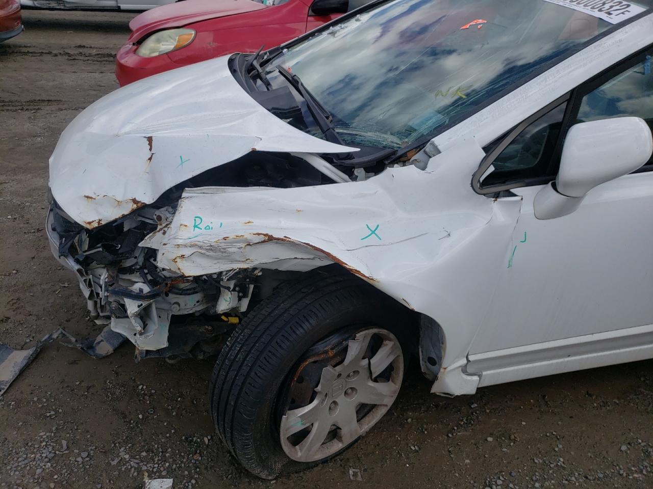 Photo 9 from auction – 2011 HONDA CIVIC LX with VIN 19XFA1F59BE006535