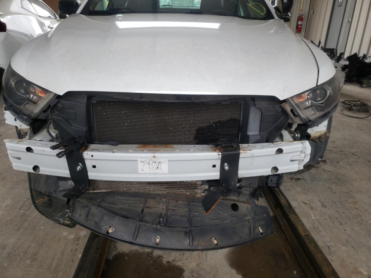 Photo 9 from auction – 2016 FORD TAURUS POL with VIN 1FAHP2MK5GG138498
