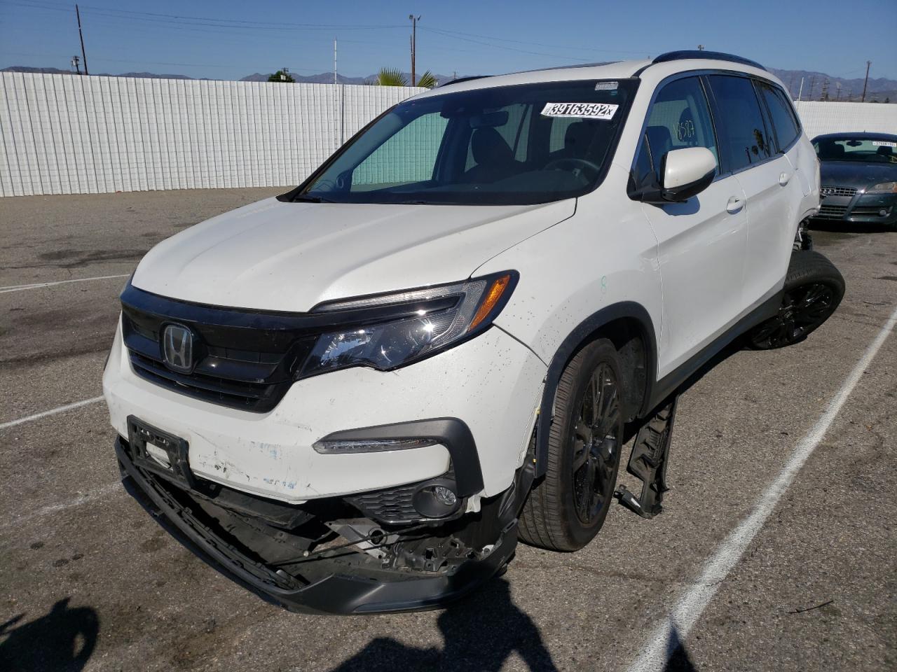 Photo 2 from auction – 2021 HONDA PILOT with VIN 5FNYF5H28MB011095