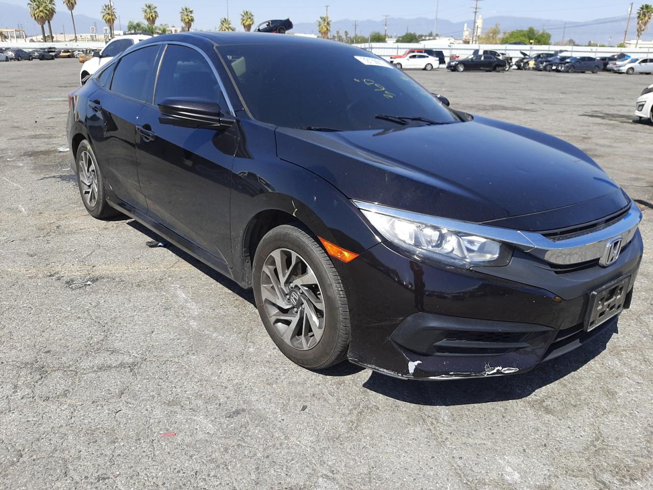 HONDA CIVIC EX 2017 with VIN 19XFC2F75HE068363 - Photo from auction