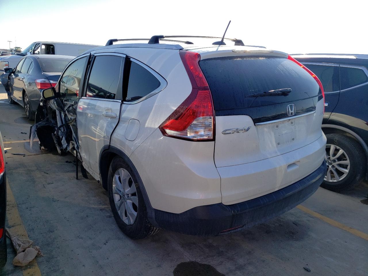 Photo 3 from auction – 2012 HONDA CR-V EXL with VIN 5J6RM3H77CL016630