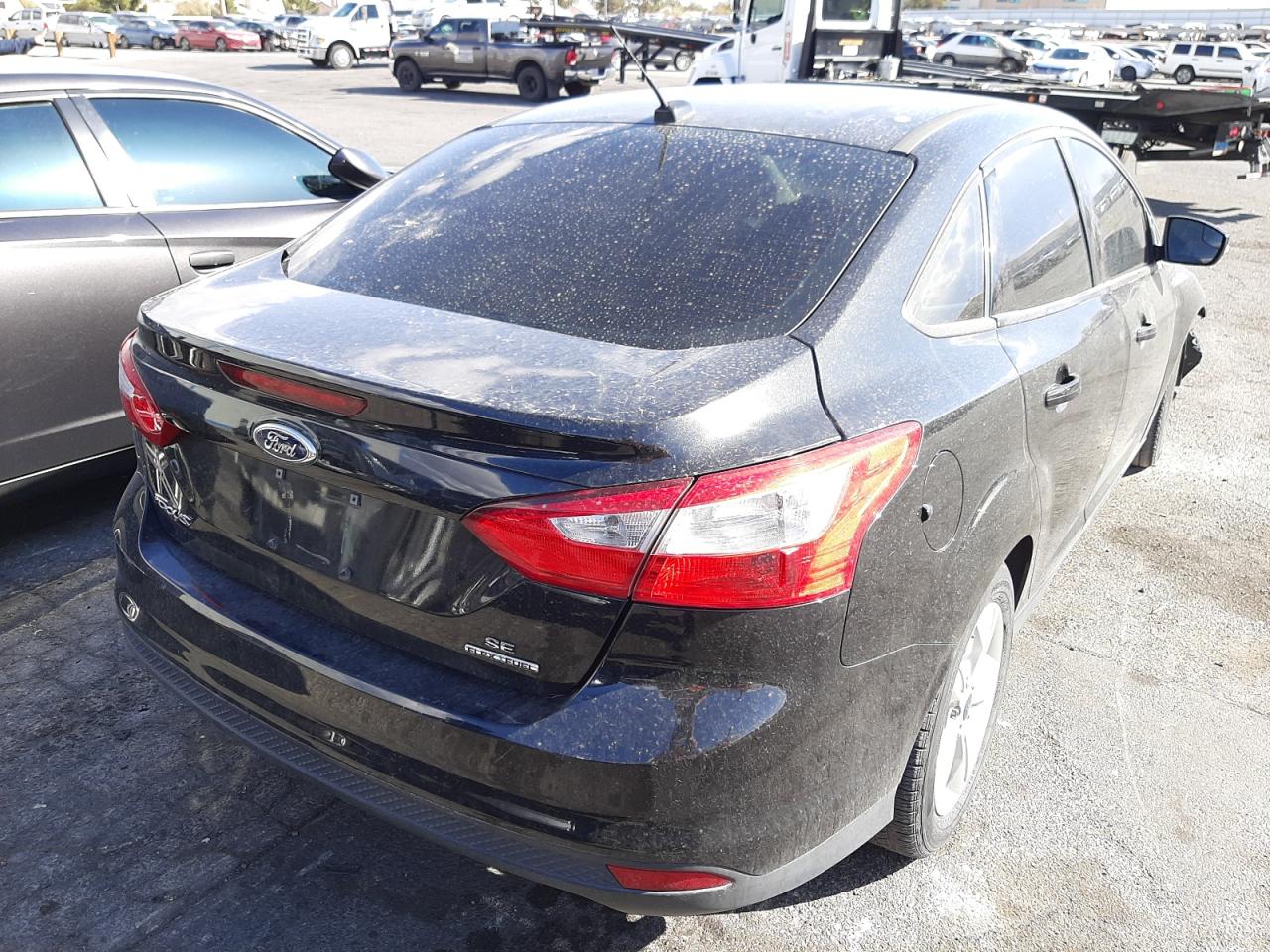 Фото 4 с аукциона – 2014 FORD FOCUS SE с VIN 1FADP3F26EL276640