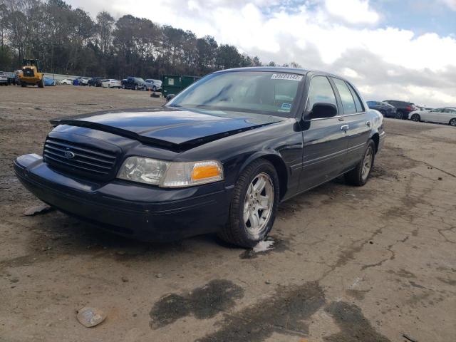 Photo 2 from auction – 2002 FORD CROWN VICT with VIN 2FAFP74W42X112419