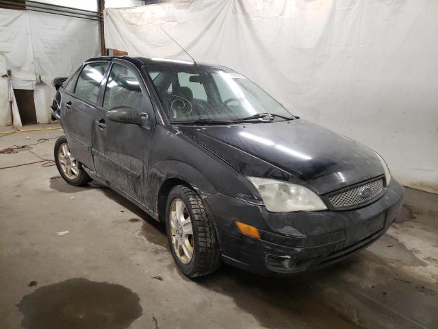 FORD FOCUS 2007 with VIN 1FAFP38Z47W218739 - Photo from auction