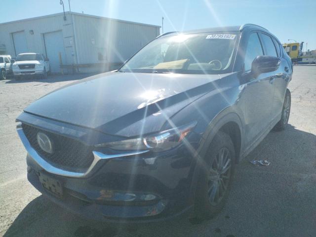 Photo 2 from auction – 2021 MAZDA CX-5 TOURI with VIN JM3KFBCM1M0437231