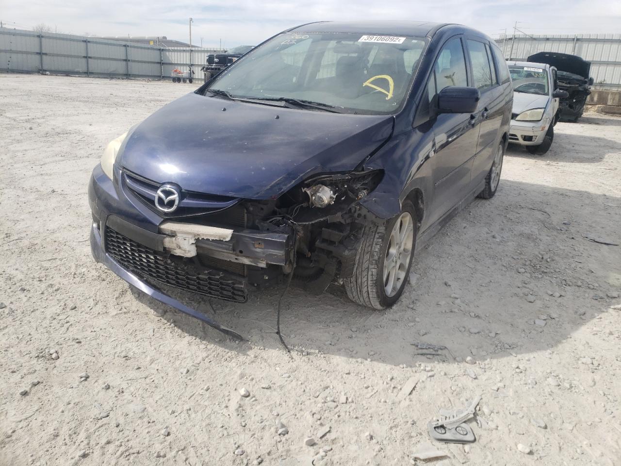 Photo 2 from auction – 2009 MAZDA 5 with VIN JM1CR293X90330947