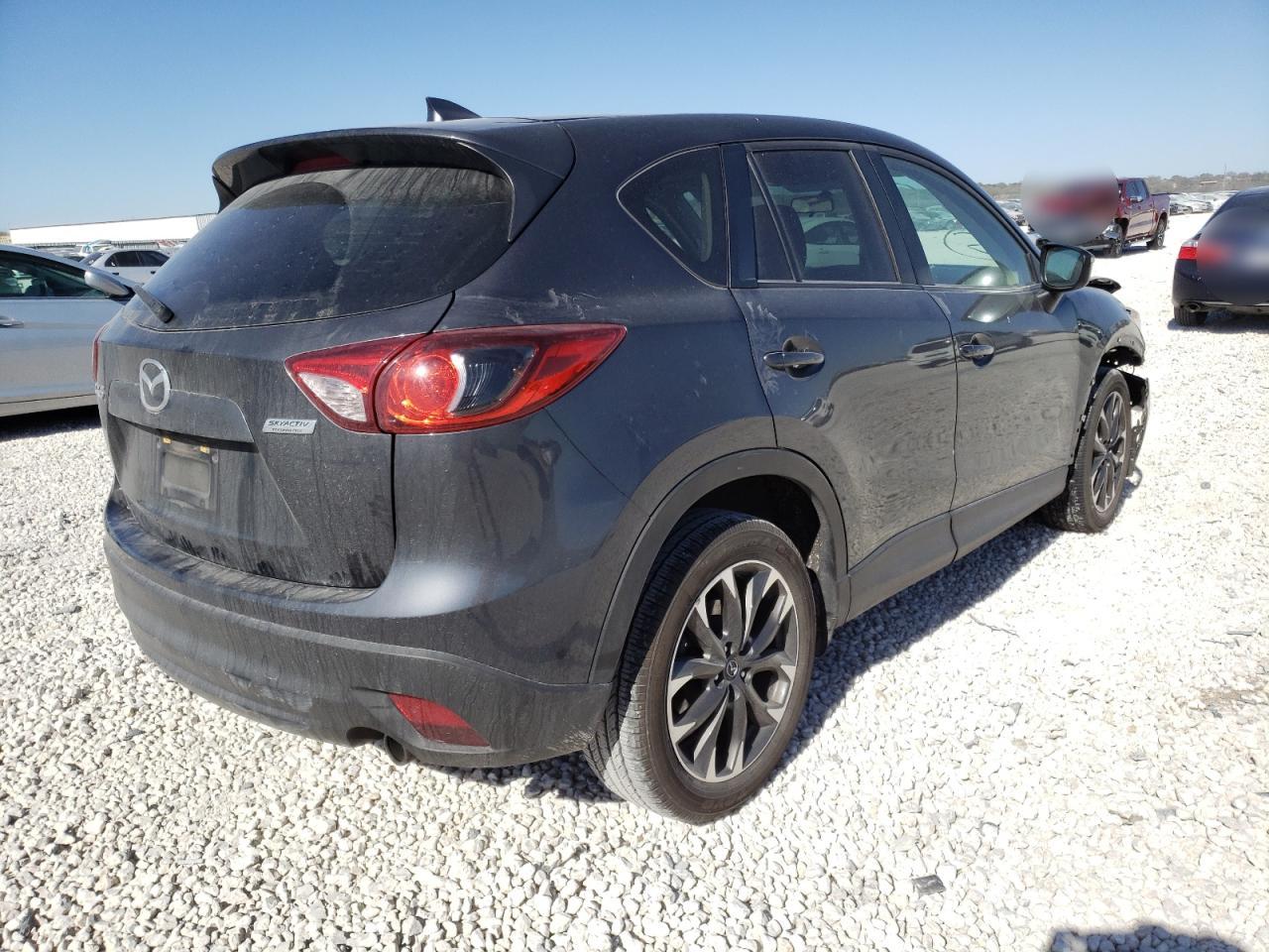 Photo 4 from auction – 2016 MAZDA CX-5 GT with VIN JM3KE2DY0G0772084