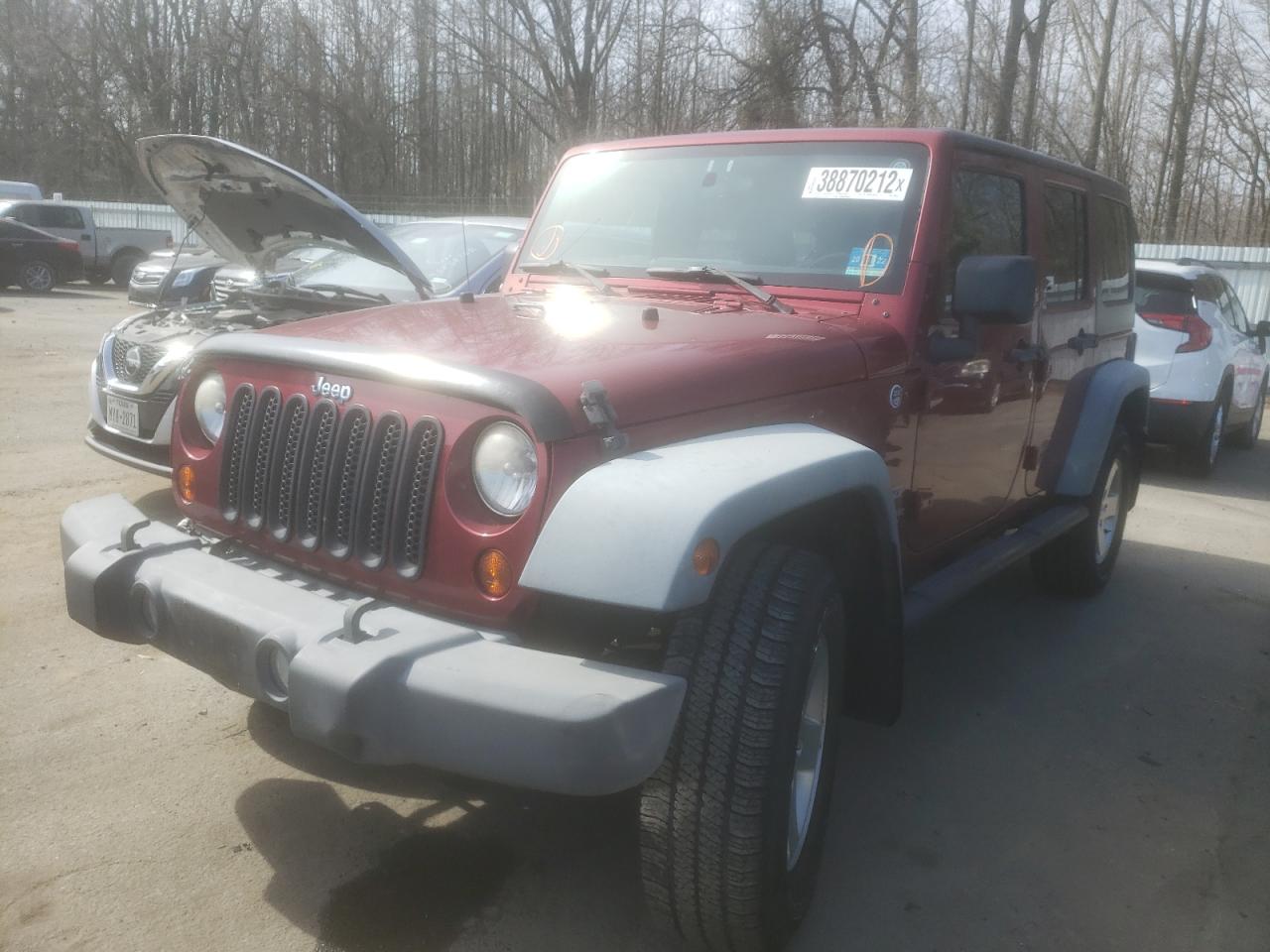 Photo 2 from auction – 2012 JEEP WRANGLER U with VIN 1C4BJWDG2CL141056