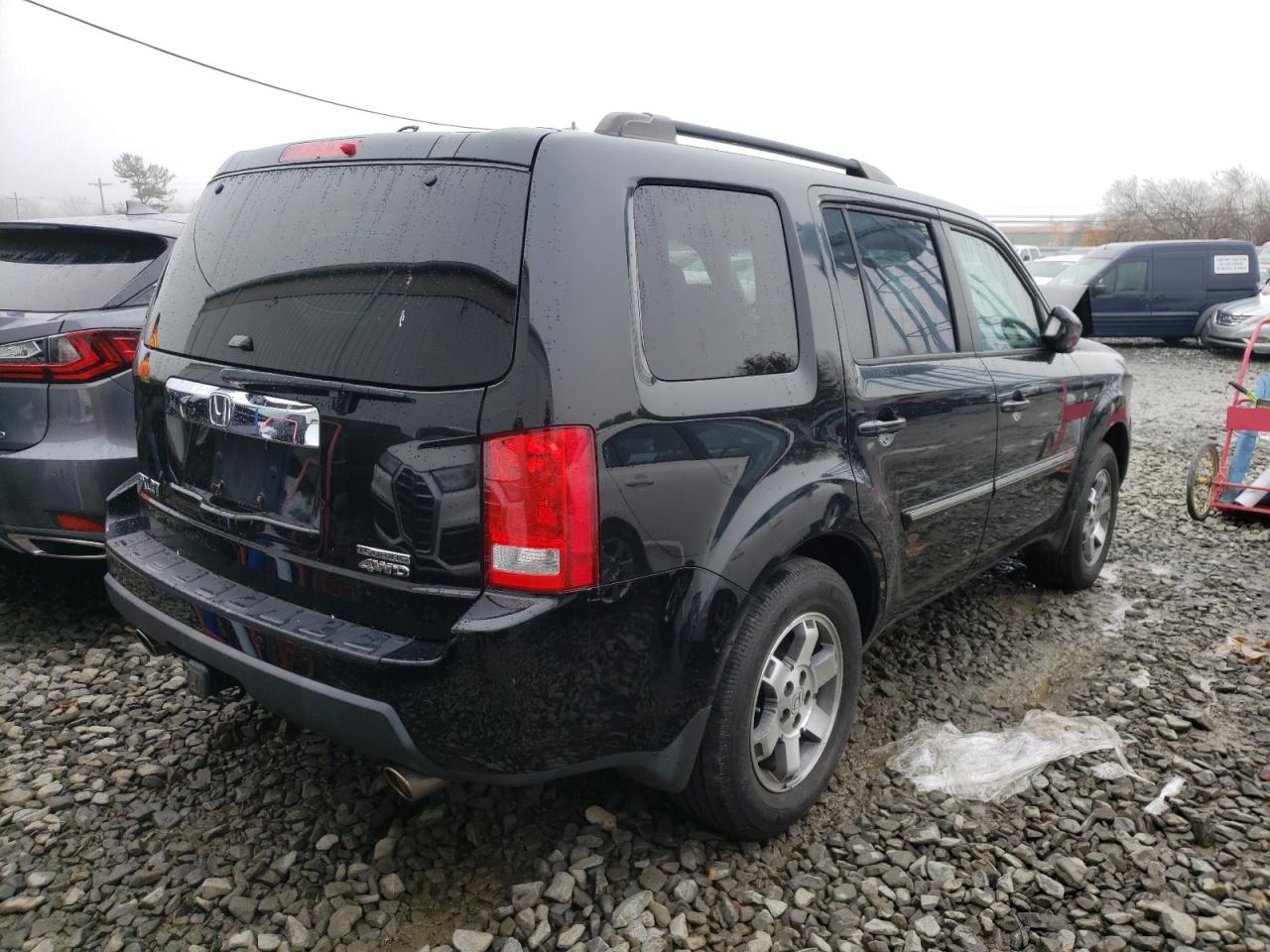 Photo 4 from auction – 2010 HONDA PILOT TOUR with VIN 5FNYF4H92AB010107