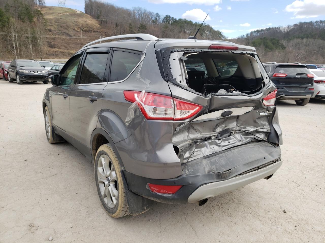 Photo 3 from auction – 2014 FORD ESCAPE TIT with VIN 1FMCU9J91EUE23555