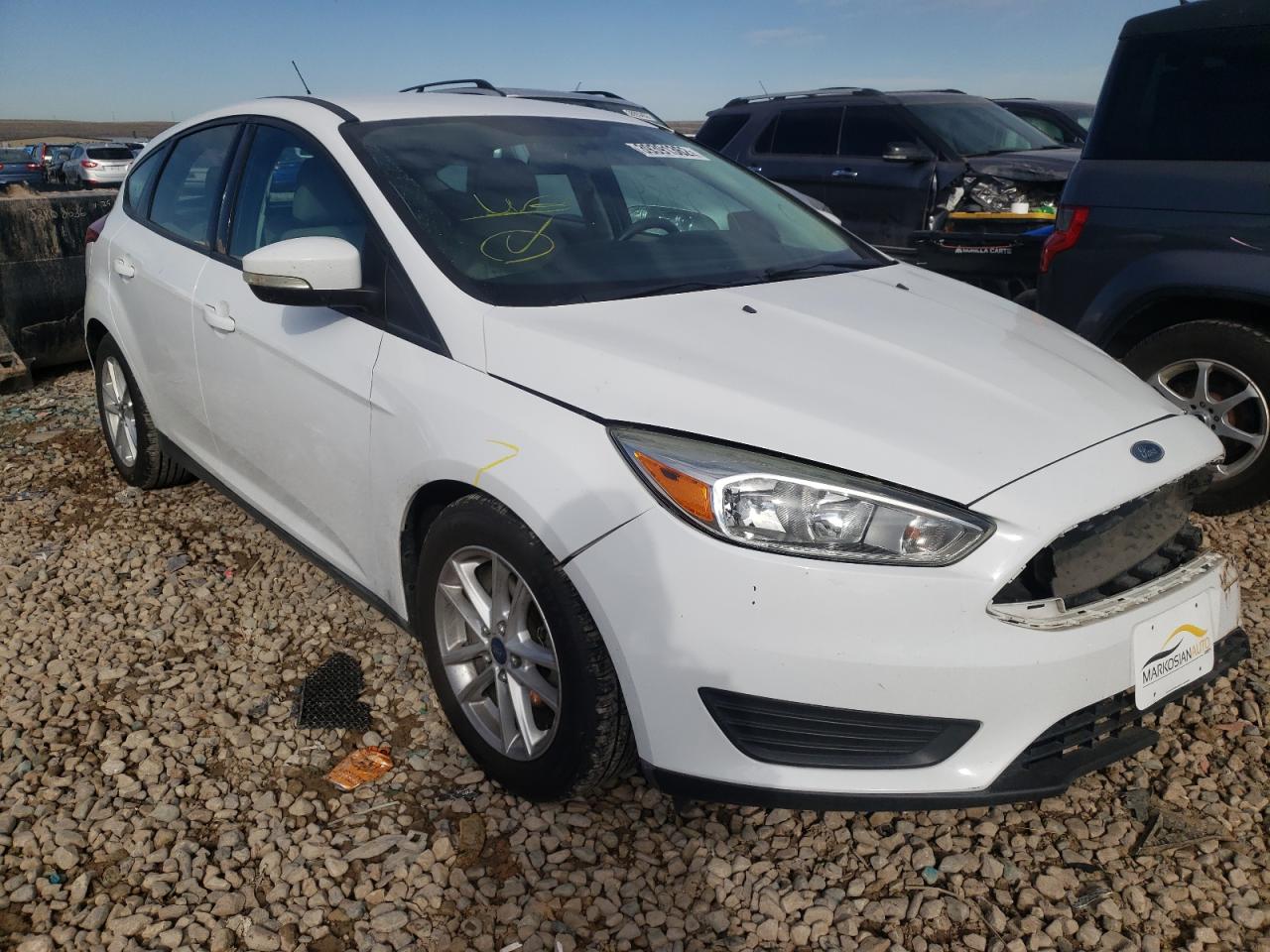 FORD FOCUS SE 2015 with VIN 1FADP3K2XFL306116 - Photo from auction