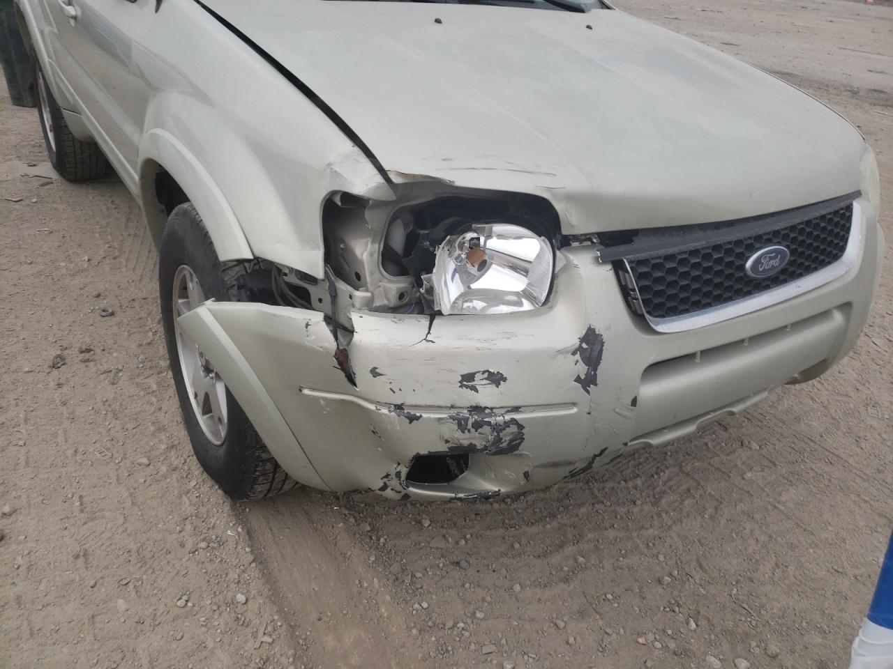 Photo 9 from auction – 2004 FORD ESCAPE LIM with VIN 1FMCU94104KB51208