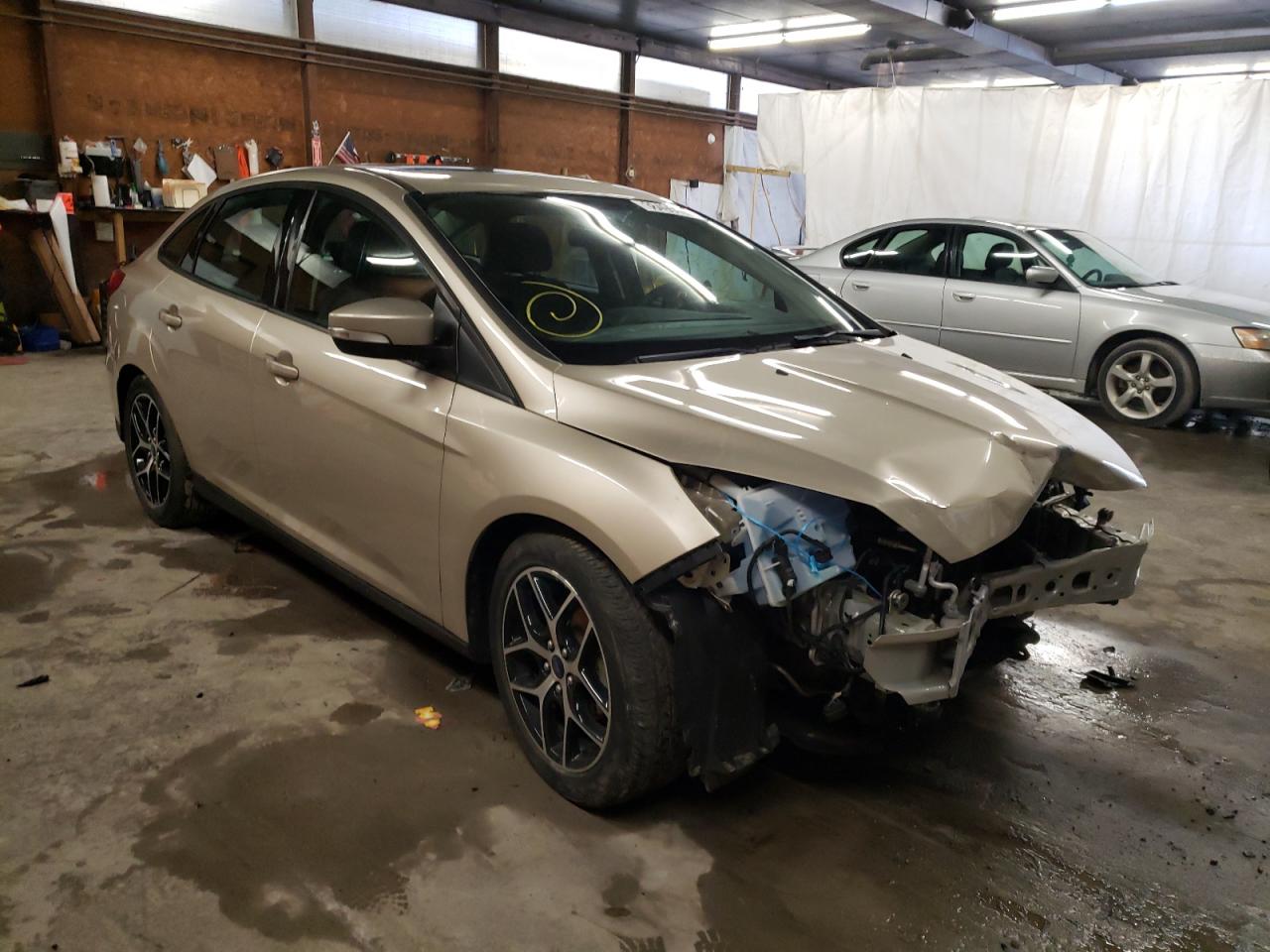 FORD FOCUS SEL 2017 with VIN 1FADP3H21HL330721 - Photo from auction