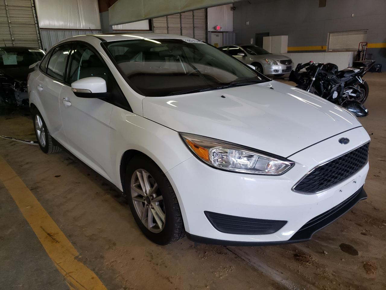 FORD FOCUS SE 2016 with VIN 1FADP3F21GL269145 - Photo from auction