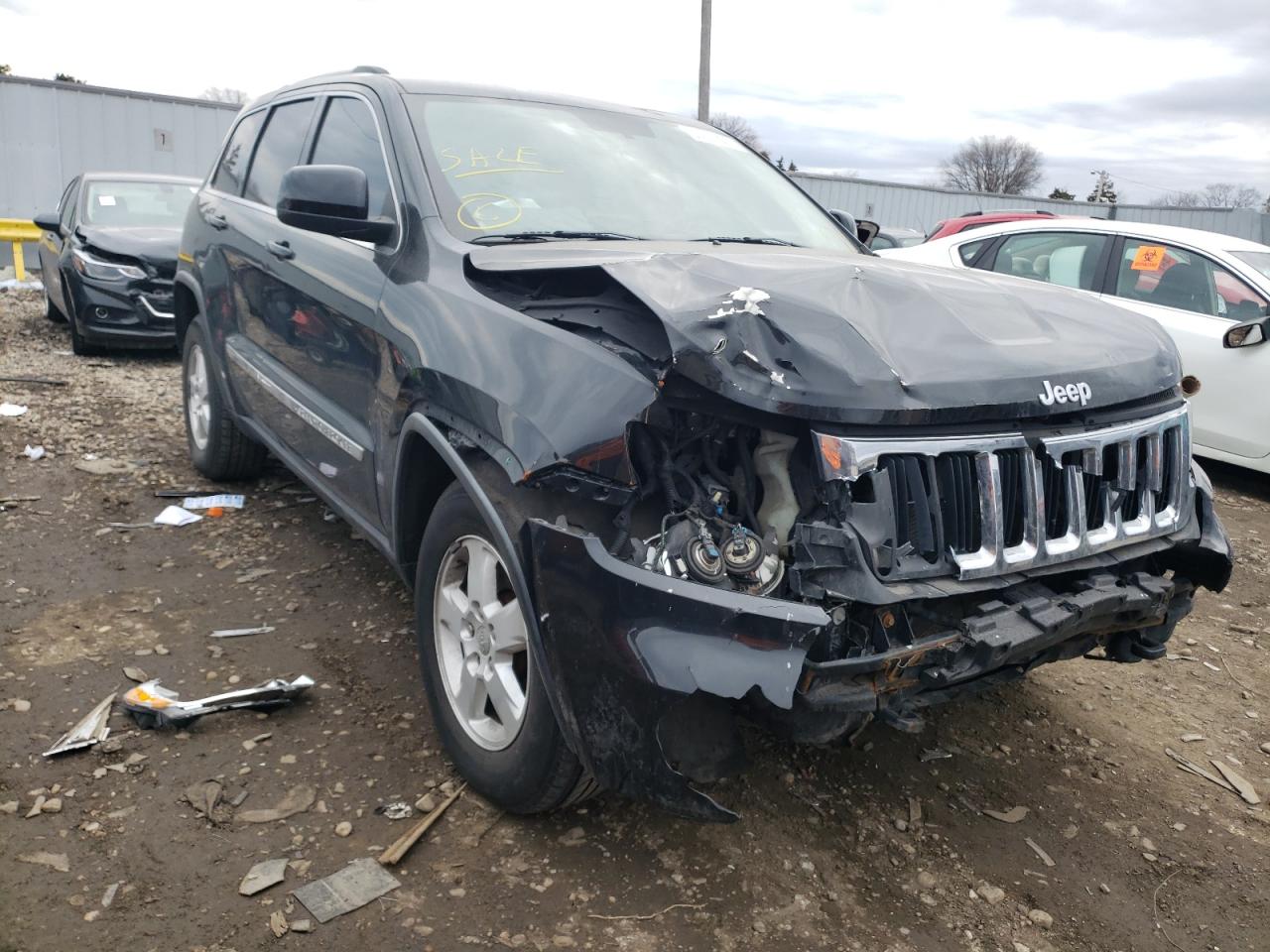 JEEP GRAND CHER 2011 with VIN 1J4RR4GGXBC515431 - Photo from auction