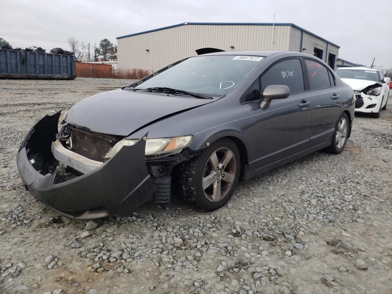 Photo 2 from auction – 2011 HONDA CIVIC LX-S with VIN 19XFA1F65BE015323