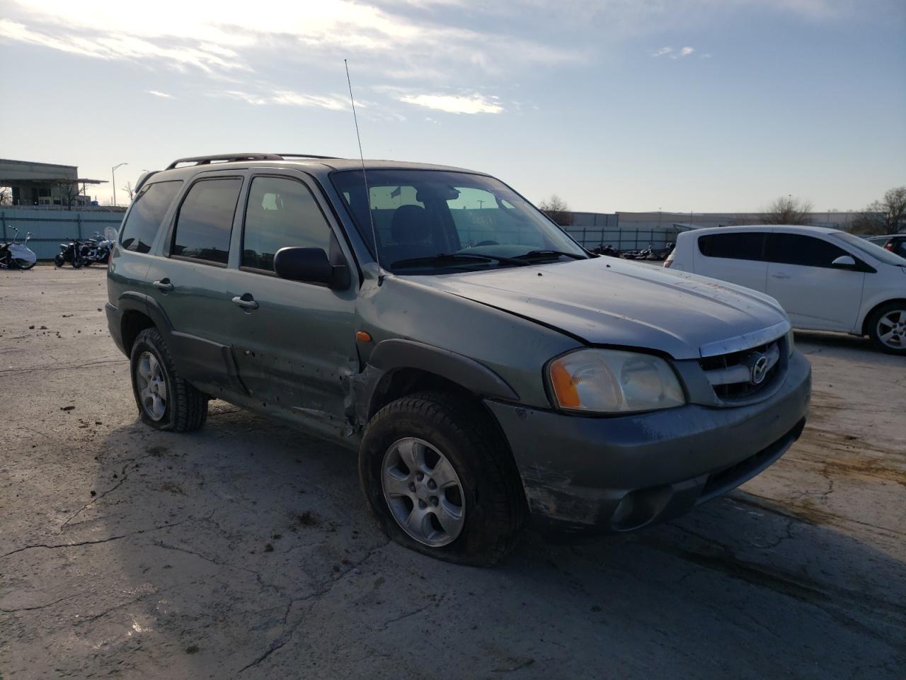 MAZDA TRIBUTE LX 2003 with VIN 4F2YZ04143KM37410 - Photo from auction