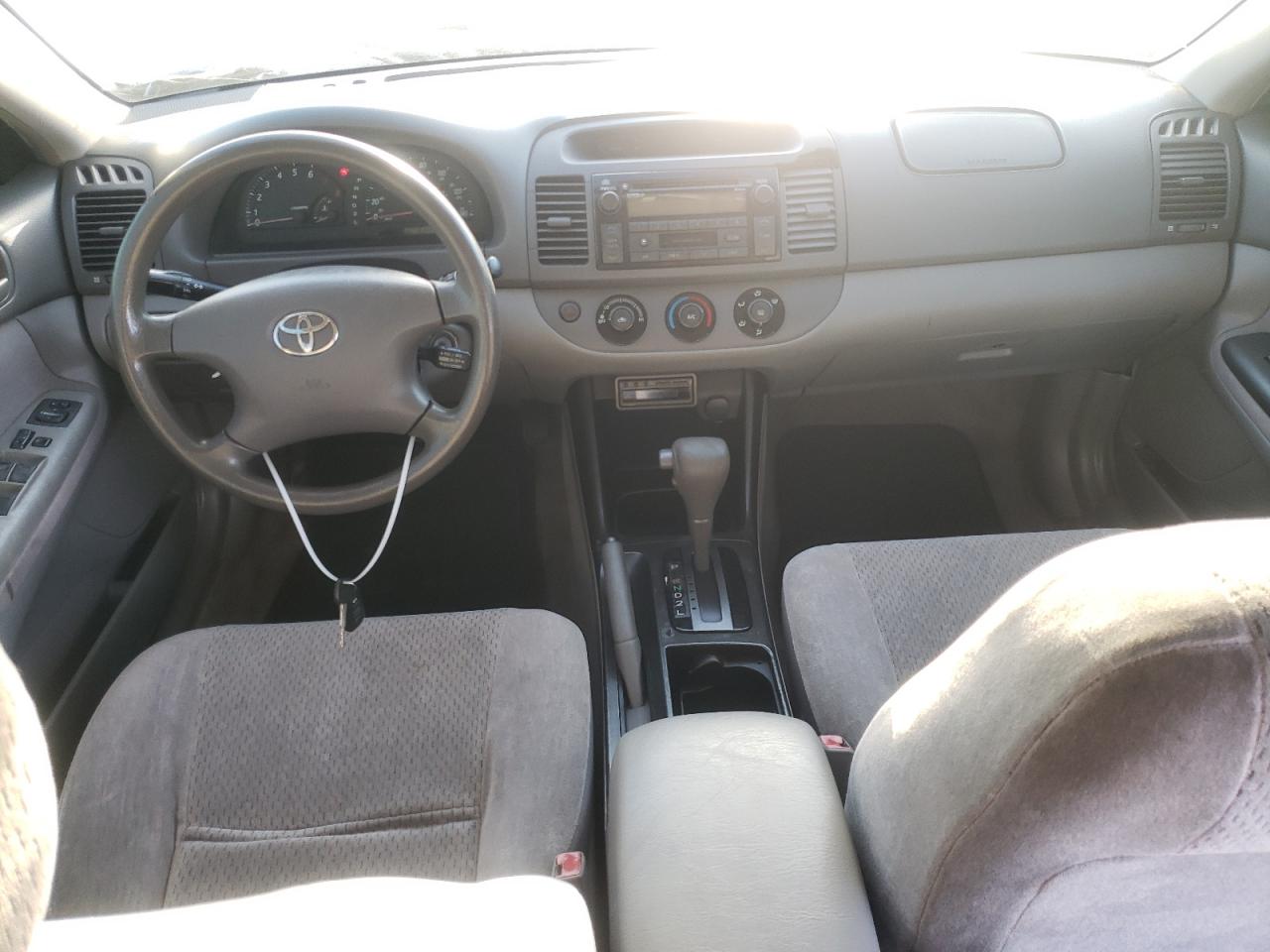 Photo 9 from auction – 2003 TOYOTA CAMRY LE with VIN JTDBE32KX30239652