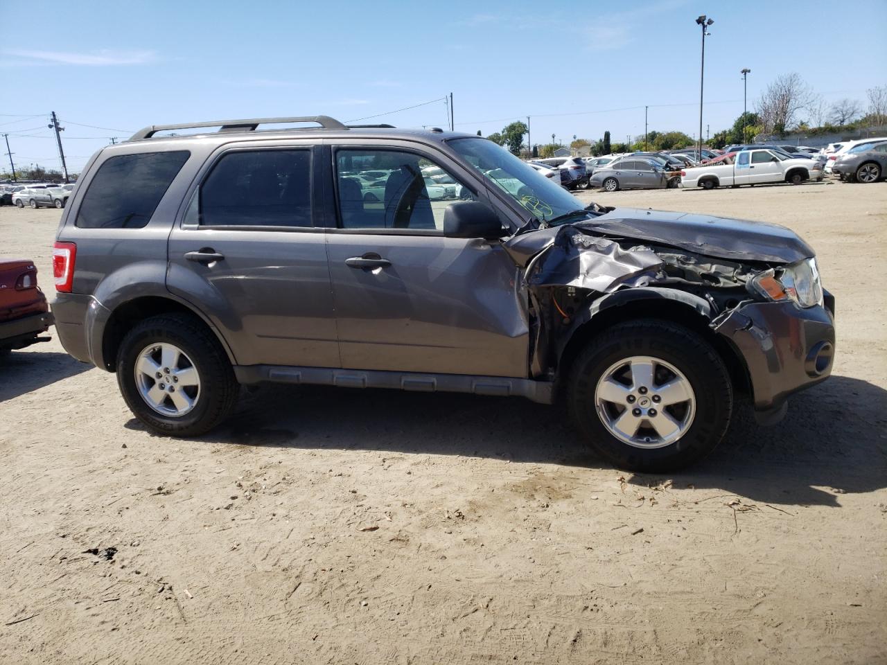 Photo 9 from auction – 2011 FORD ESCAPE XLT with VIN 1FMCU9D73BKC11628