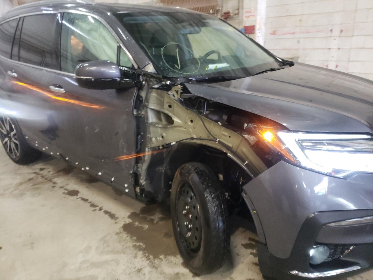 Photo 9 from auction – 2019 HONDA PILOT ELIT with VIN 5FNYF6H07KB048429