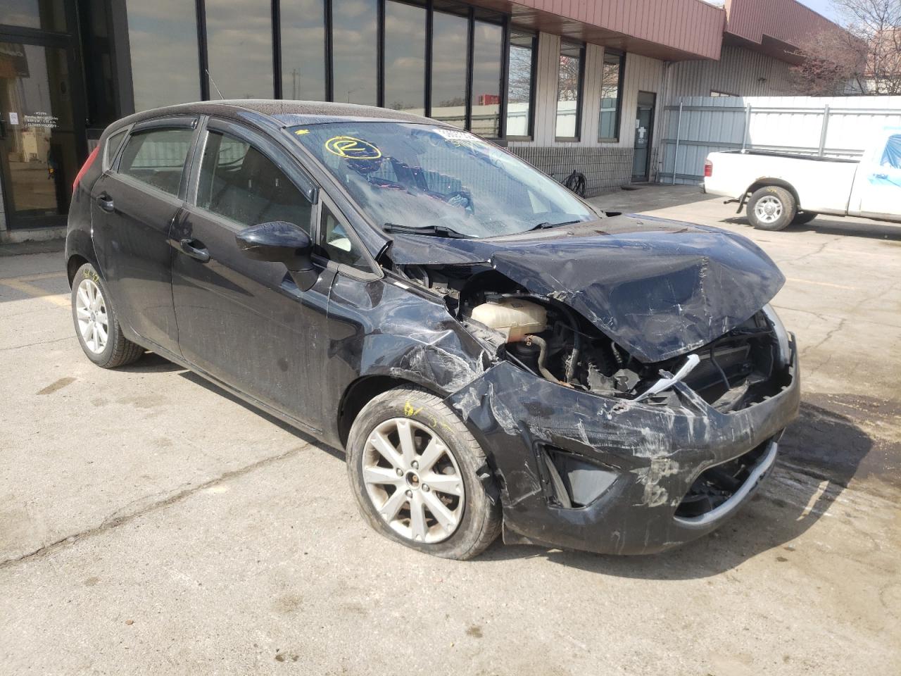 FORD FIESTA SE 2011 with VIN 3FADP4EJ8BM212284 - Photo from auction