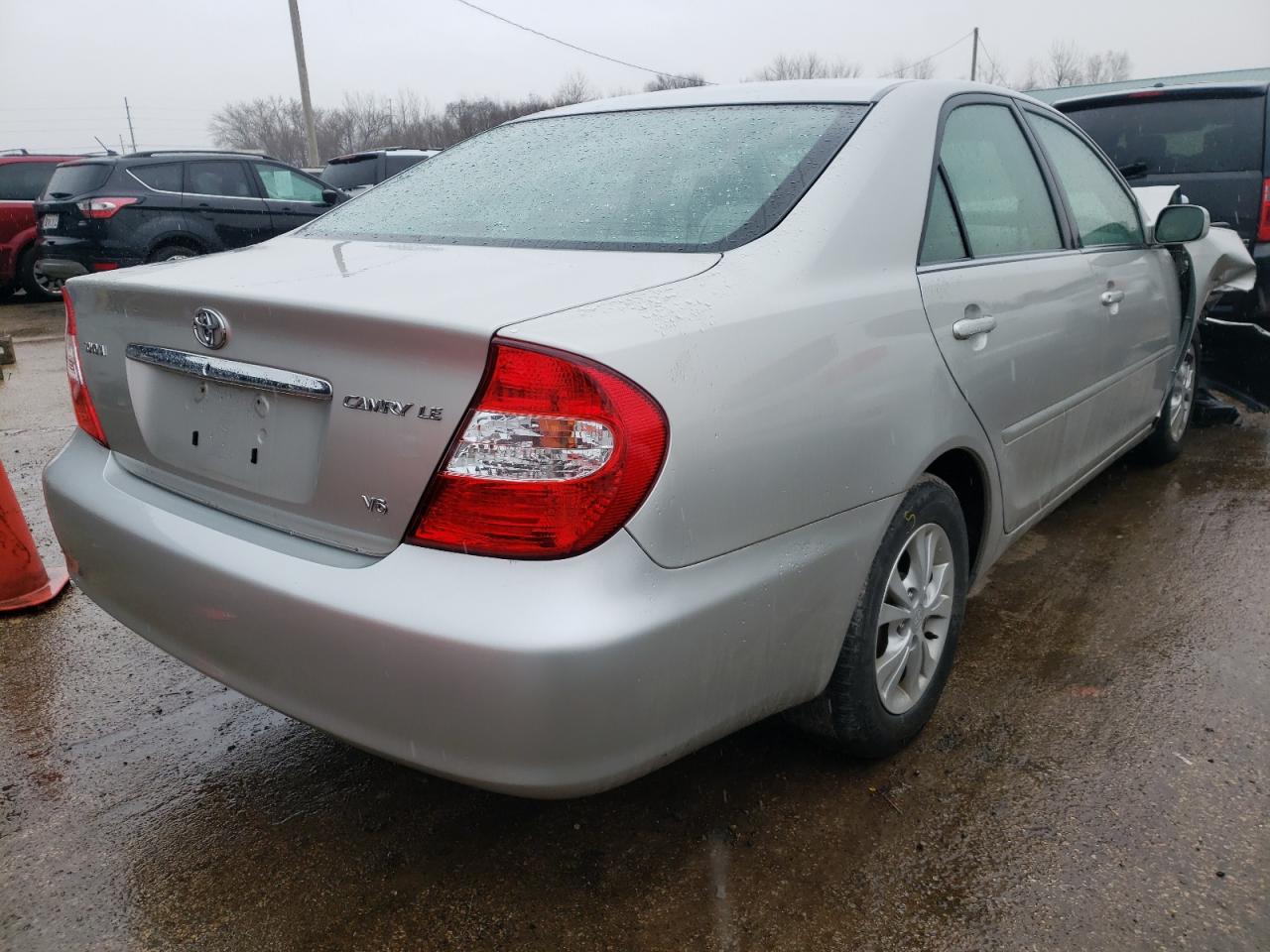 Photo 4 from auction – 2004 TOYOTA CAMRY LE with VIN 4T1BF30K64U574090