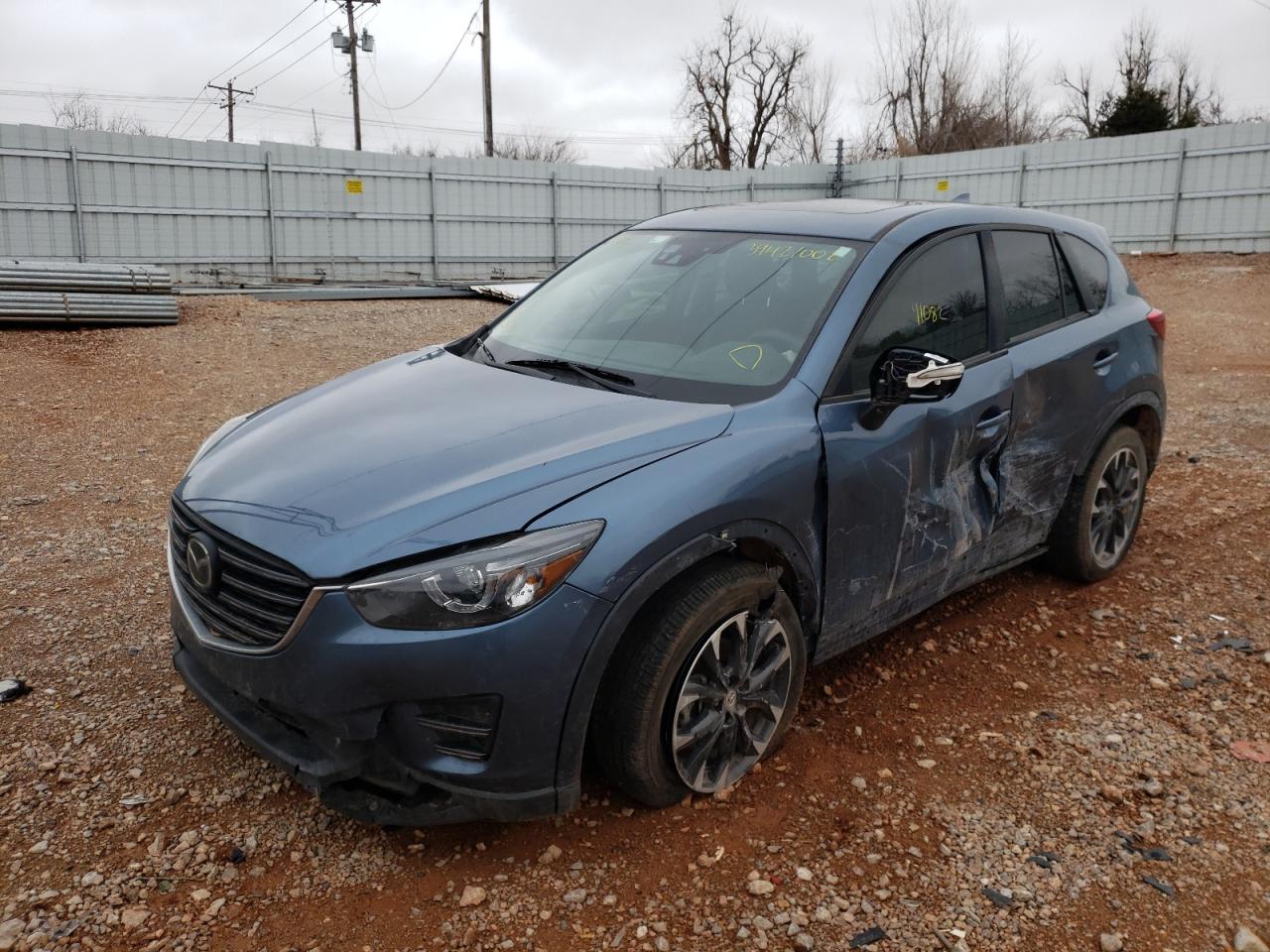 Photo 2 from auction – 2016 MAZDA CX-5 GT with VIN JM3KE2DY7G0912423
