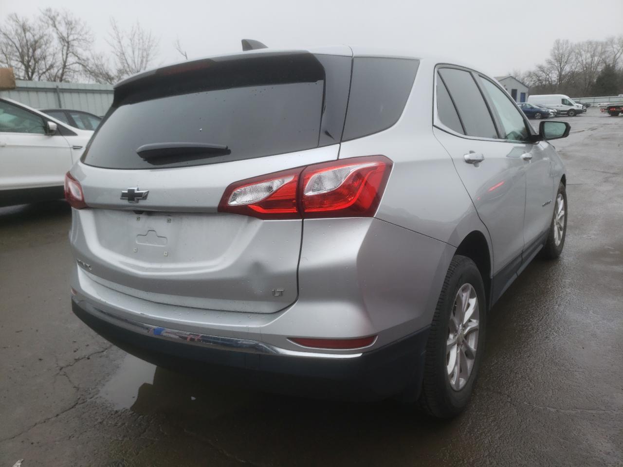 Photo 4 from auction – 2018 CHEVROLET EQUINOX LT with VIN 3GNAXJEV1JS582928