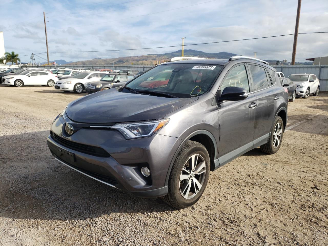 Photo 2 from auction – 2016 TOYOTA RAV4 XLE with VIN JTMWFREV2GJ090905