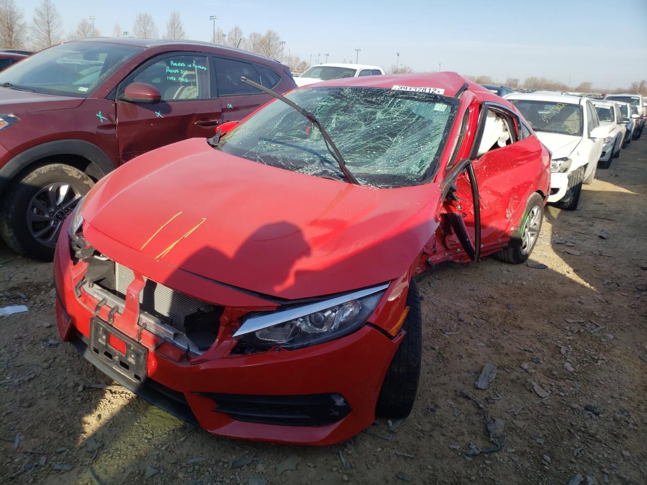 Photo 2 from auction – 2016 HONDA CIVIC LX with VIN 2HGFC2F54GH561227