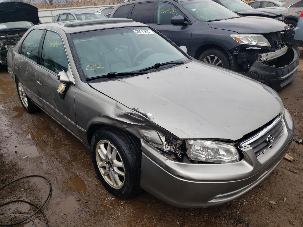 TOYOTA CAMRY LE 2000 with VIN 4T1BF28K5YU101124 - Photo from auction