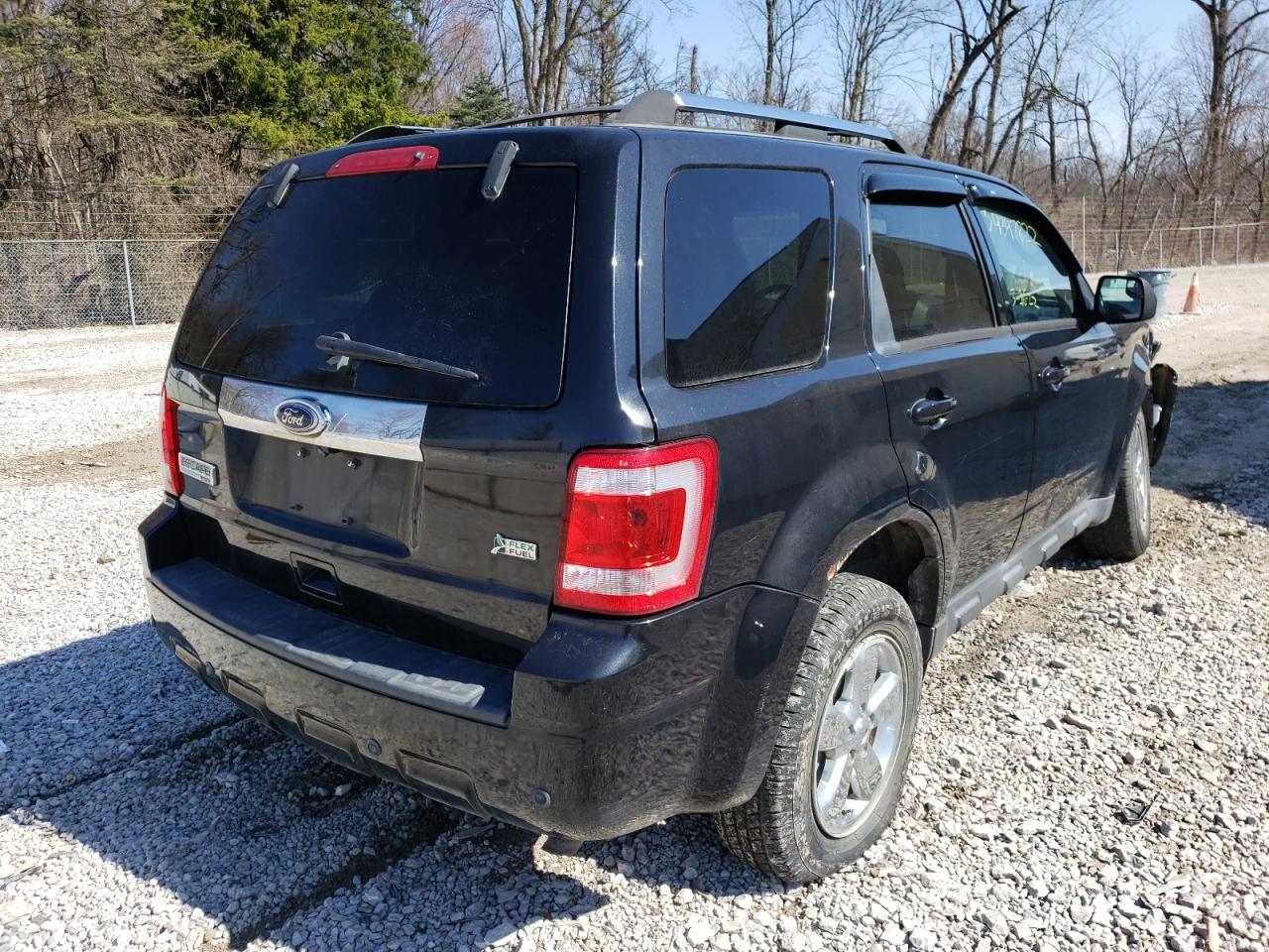 Photo 4 from auction – 2011 FORD ESCAPE LIM with VIN 1FMCU9EG8BKA42656