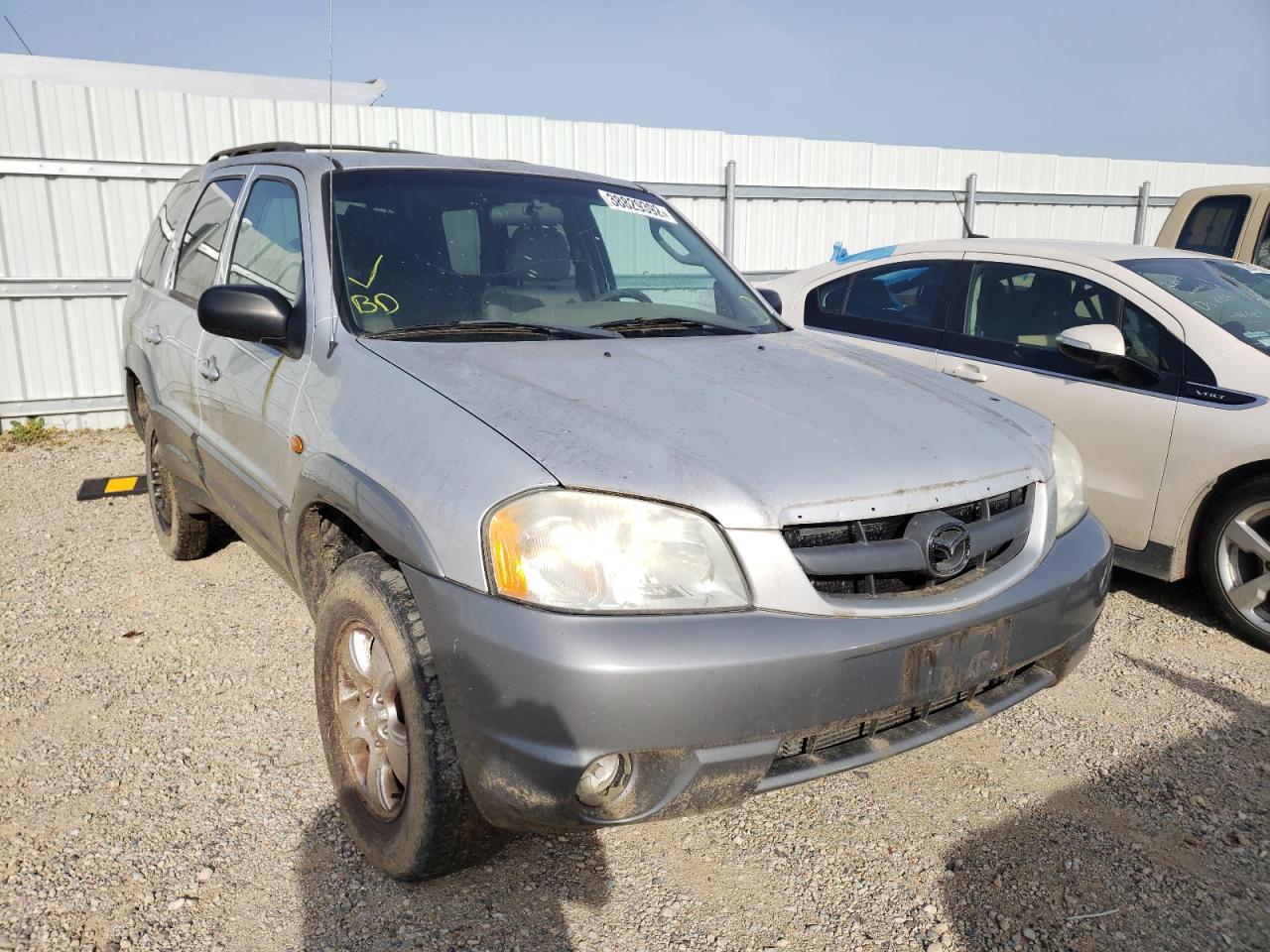MAZDA TRIBUTE LX 2002 مع رقم تعريف المركبة 4F2YU081X2KM08971 - صورة من المزاد