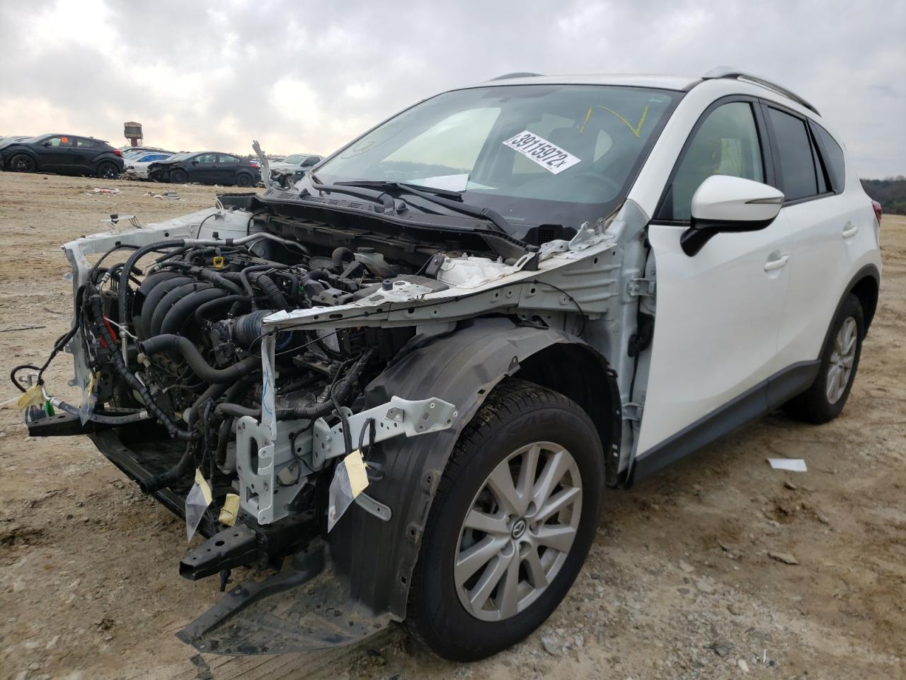 Photo 2 from auction – 2016 MAZDA CX-5 TOURI with VIN JM3KE2CY5G0797063