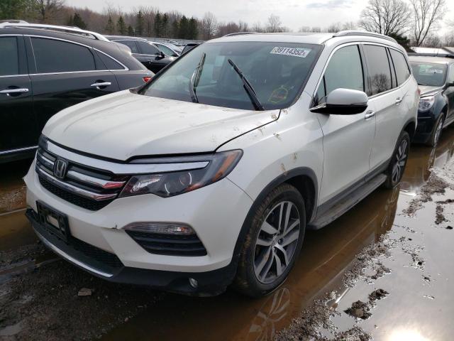 Photo 2 from auction – 2016 HONDA PILOT ELIT with VIN 5FNYF6H08GB071676