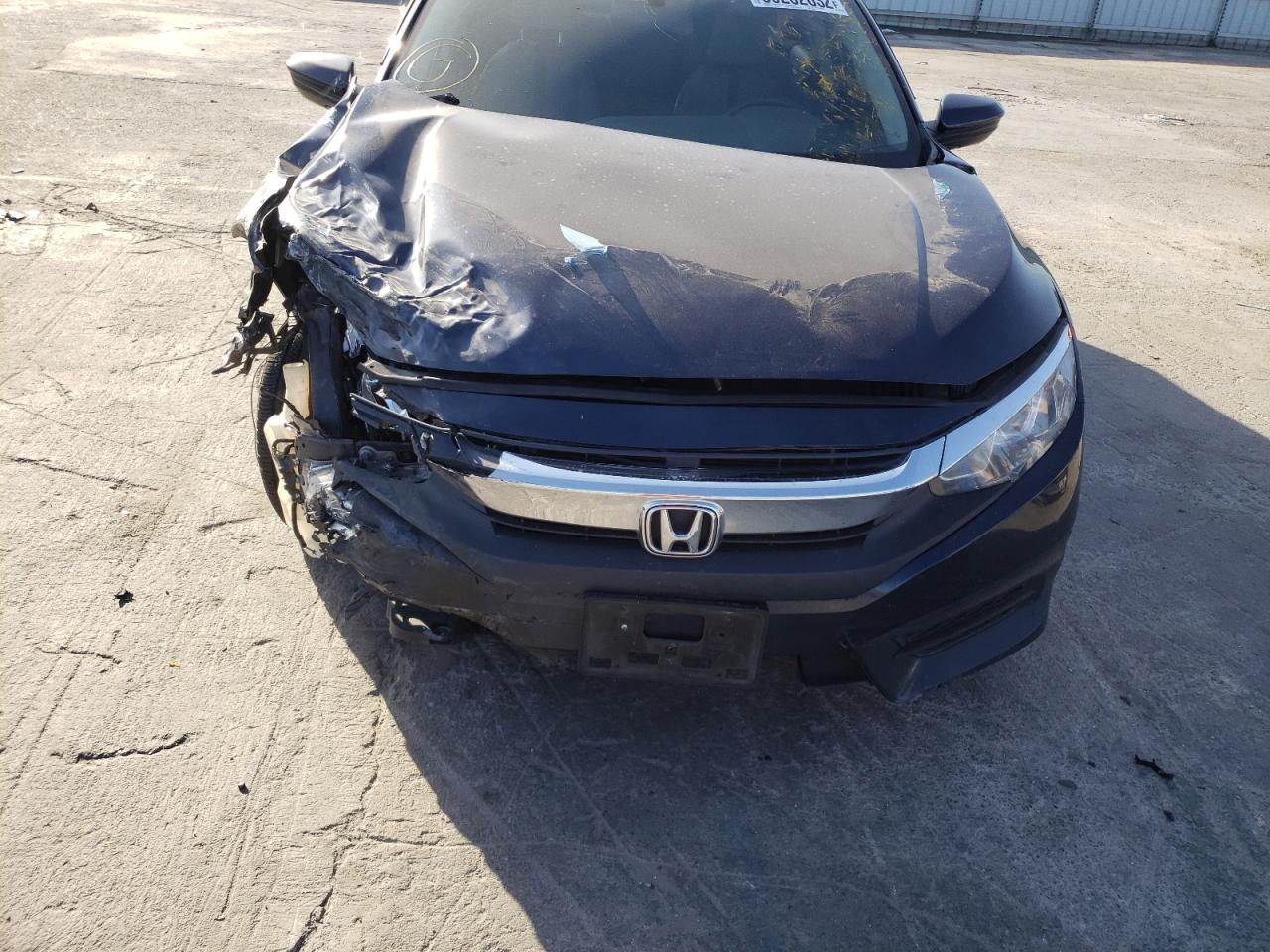 Photo 9 from auction – 2017 HONDA CIVIC LX with VIN 2HGFC2F55HH536497