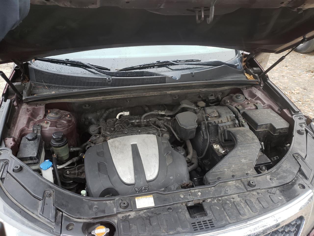 Photo 7 from auction – 2013 KIA SORENTO LX with VIN 5XYKTDA28DG335935