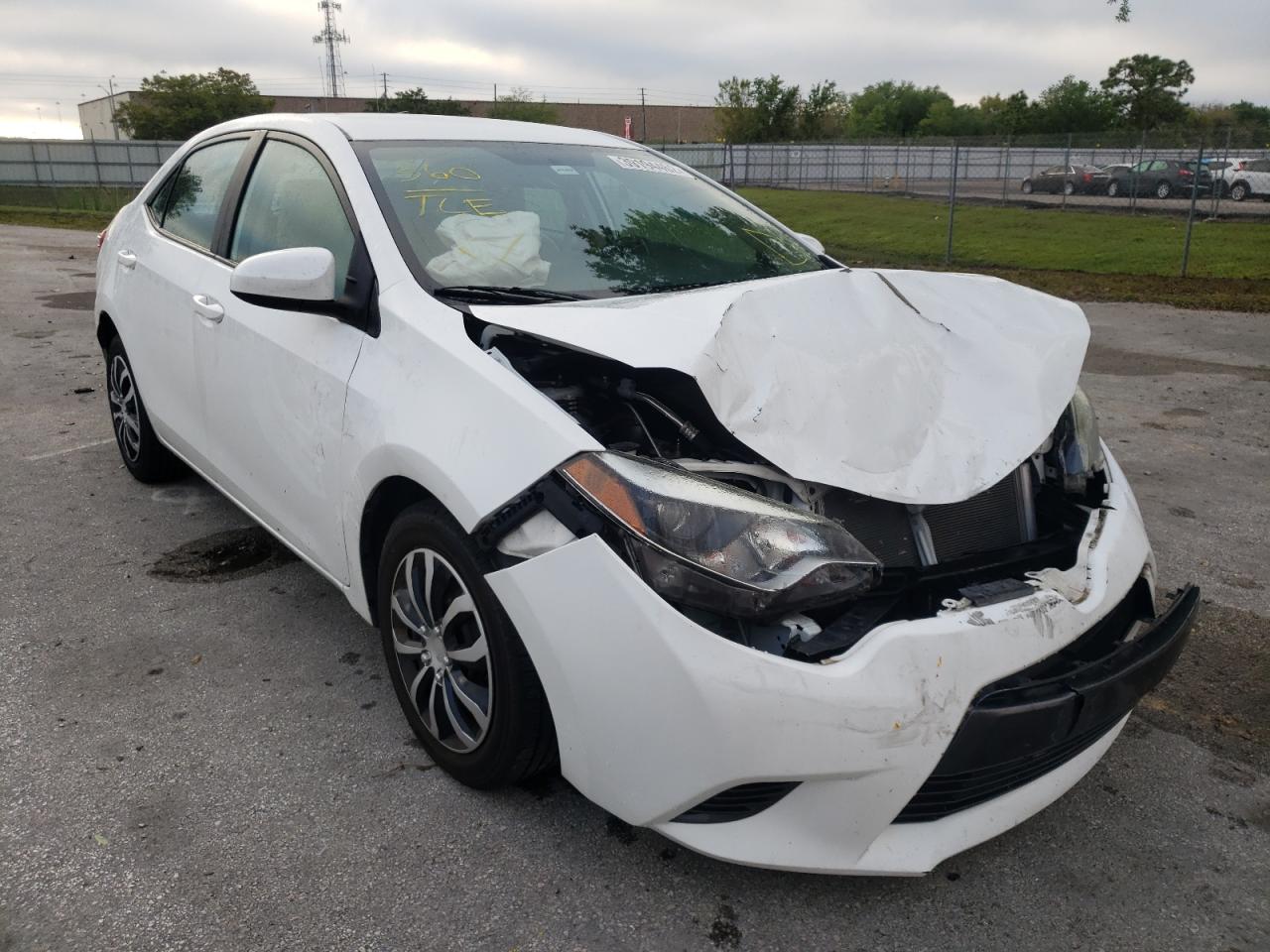 TOYOTA COROLLA L 2015 with VIN 2T1BURHE2FC290662 - Photo from auction