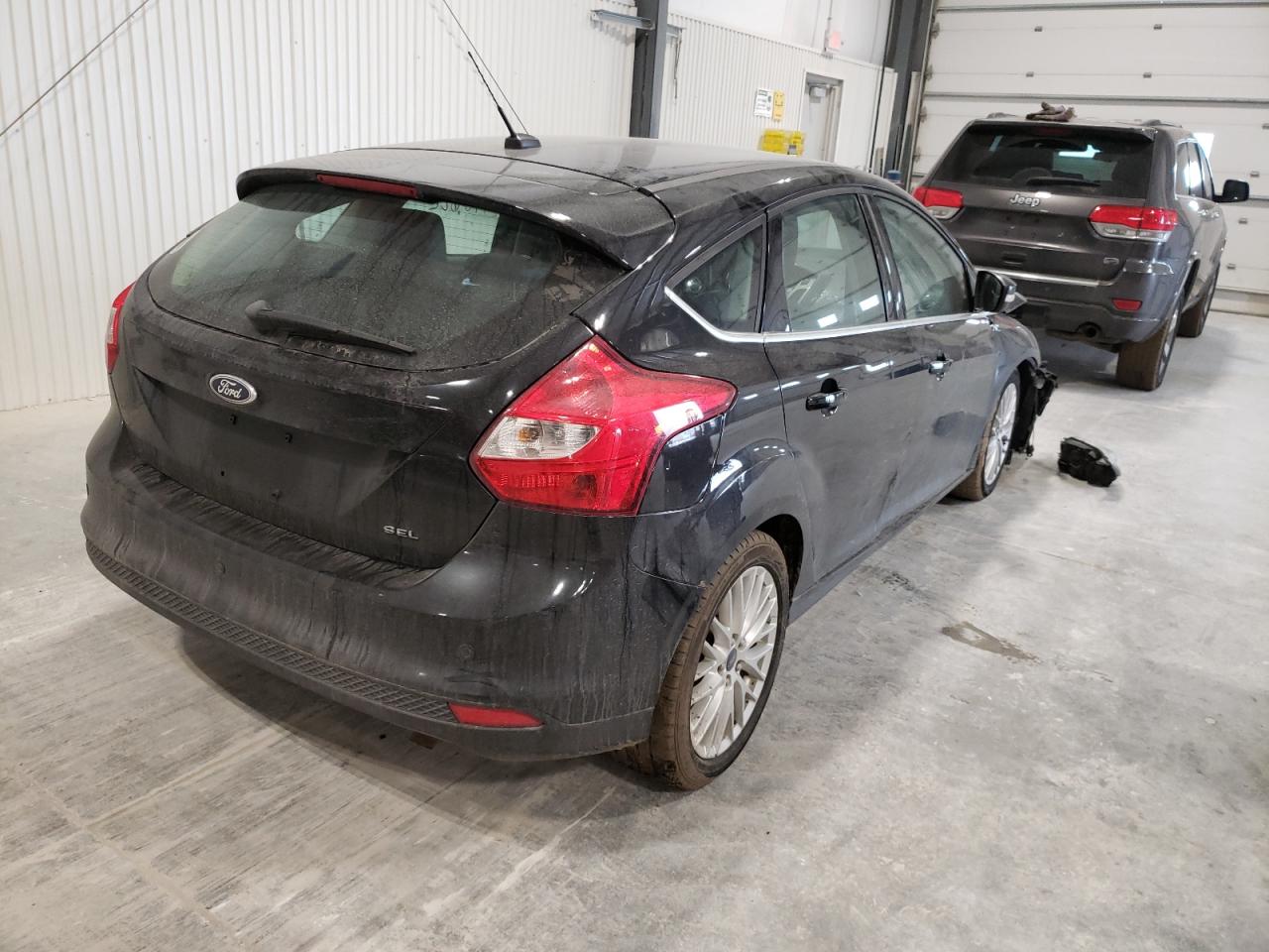 Photo 4 from auction – 2012 FORD FOCUS SEL with VIN 1FAHP3M27CL373752